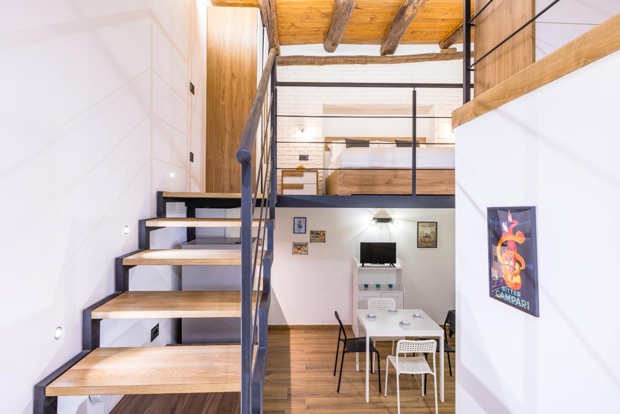 Industrial Ground Floor Studio By Wonderful Italy Apartment